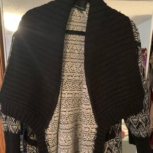 Cynthia Rowling black and white sweater